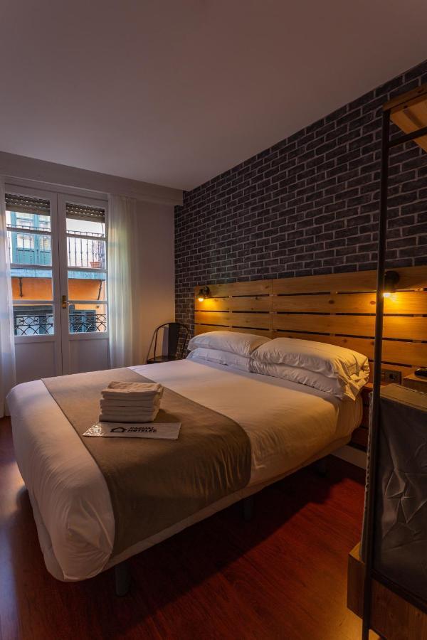 Casual Mardones 호텔 빌바오 외부 사진 A bedroom at the Hotel 925
